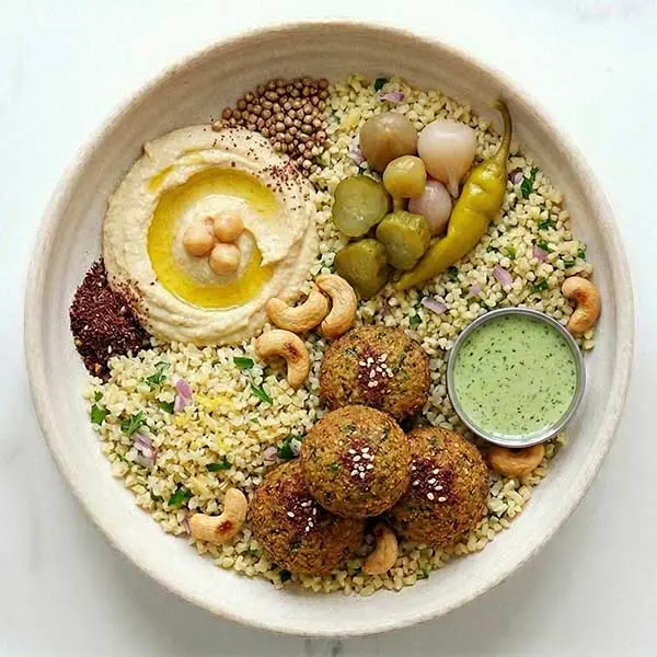 Falafel Buddha Bowl with Hummus, Pickles & Lemon Bulgur